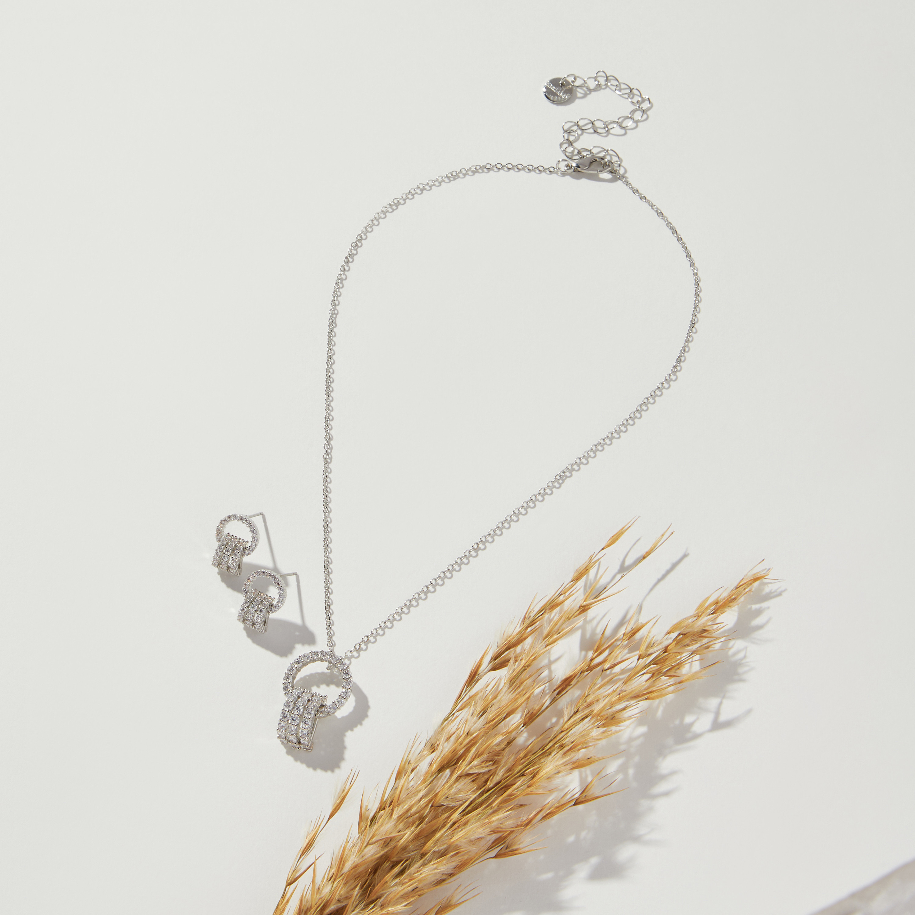 طقم عقد وأقراط مزيّن بالأحجار-women-watchesandjewellery-jewellery-jewellerysets-image-1