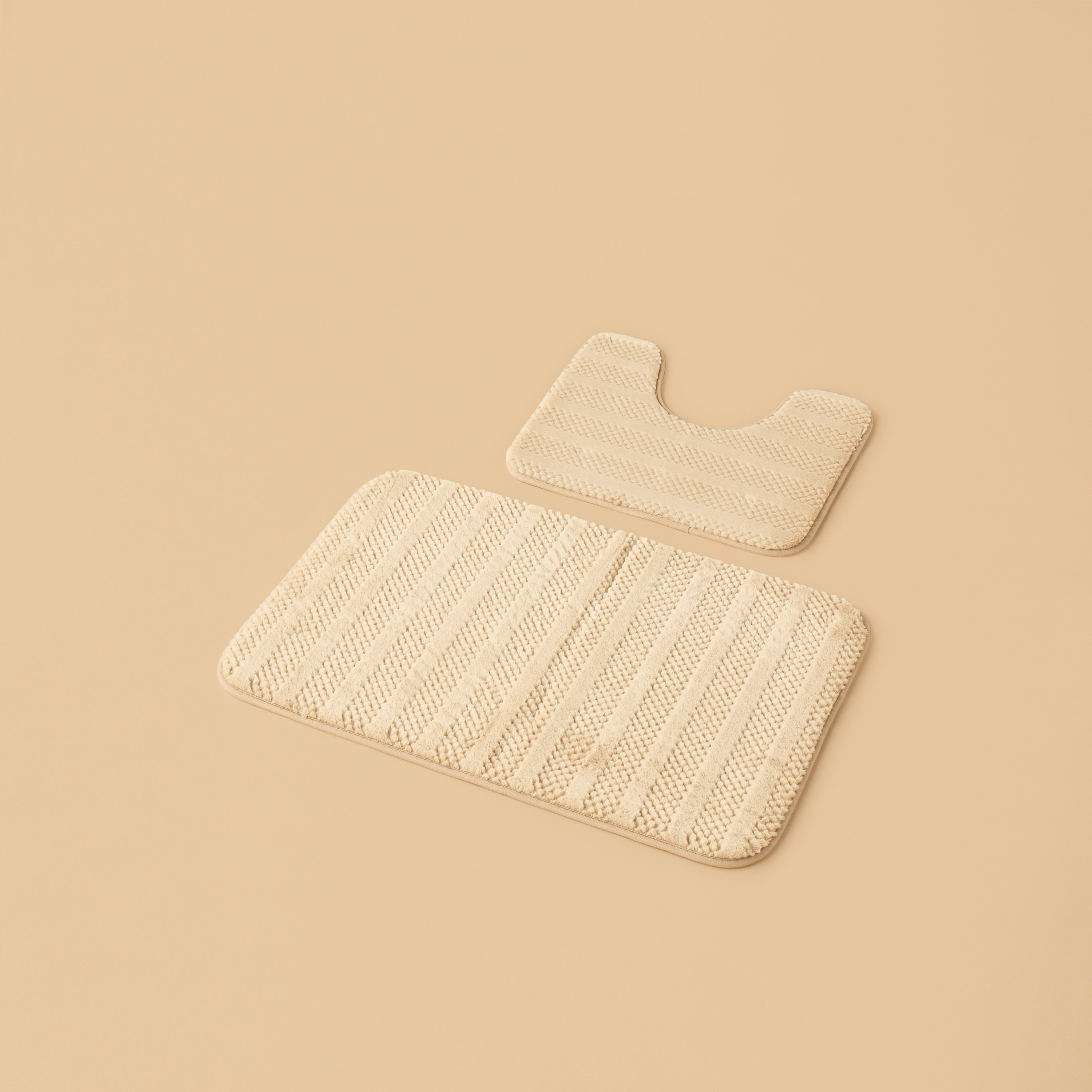 طقم سجاد حمّام إسفنجي بارز الملمس من قطعتين - 50x80 سم-household-bathandlaundry-bathlinen-bathmatsandtubmats-image-1