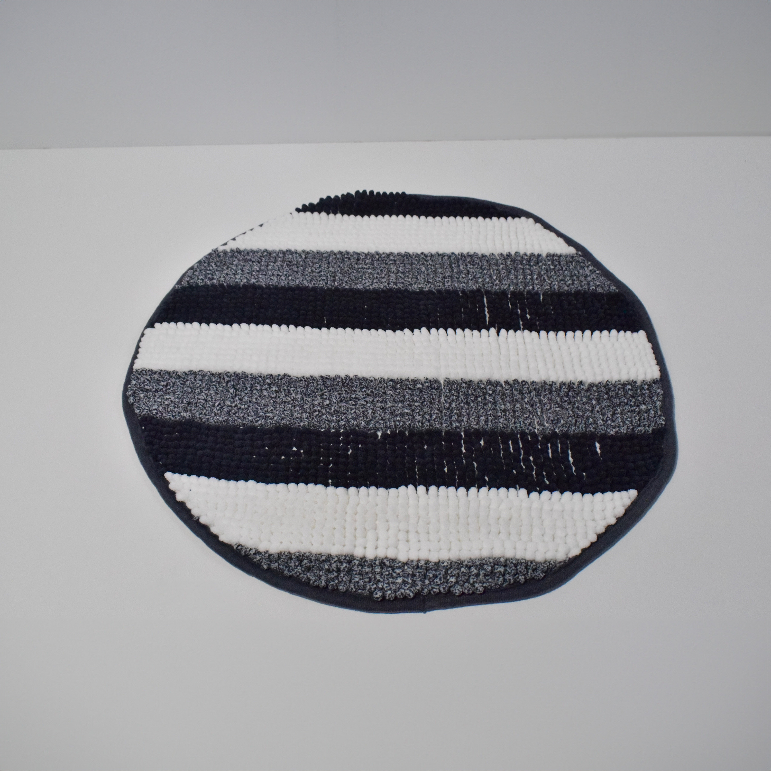 سجادة حمام مستديرة بارزة الملمس من كارلين - 50 سم-household-rugsandcarpets-doormats-image-1