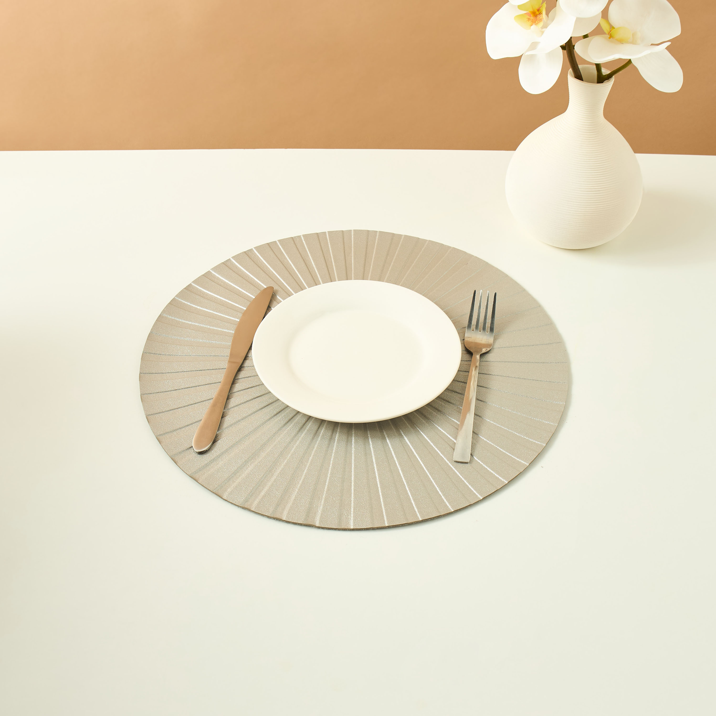 Sun Burst Embossed Faux Leather Placemat - 38 cms-household-dining-tablelinen-placemats-image-1