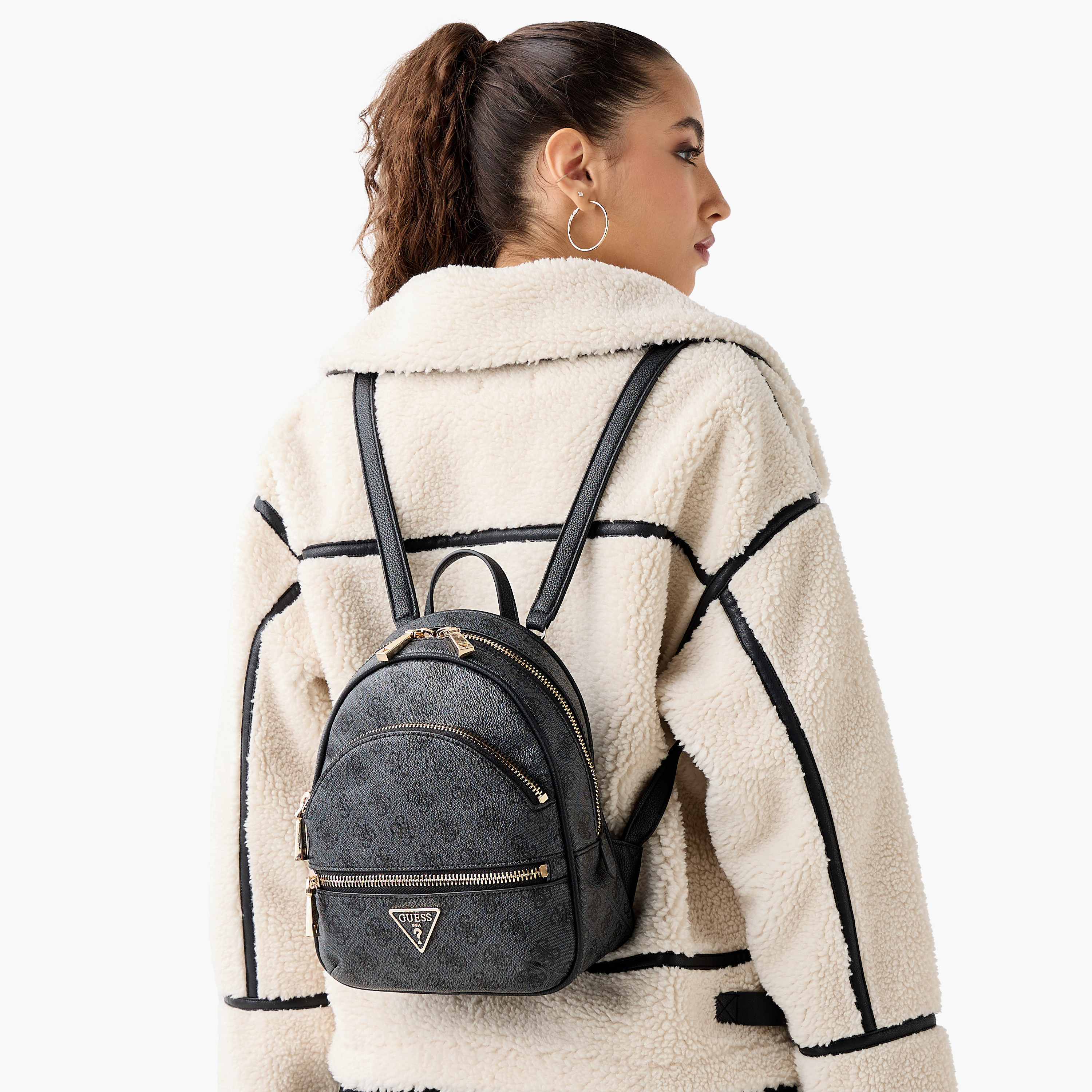 Shop Guess Manhattan Monogram Print Sling Backpack with Zip