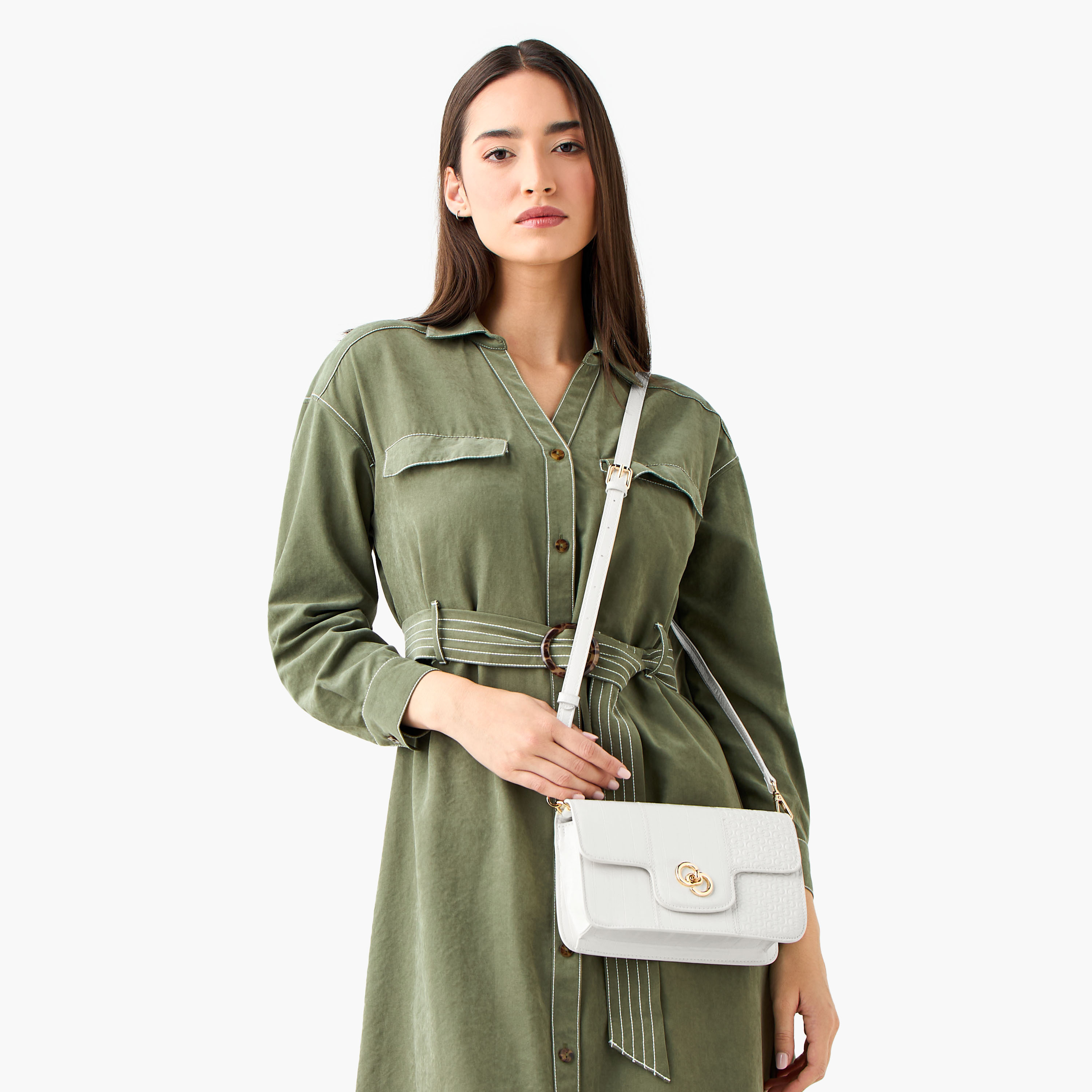 شنطة كروس بودي بقفل دوار ونقوش مونوجرام من سيليست-women-bagsandwallets-handbags-image-2