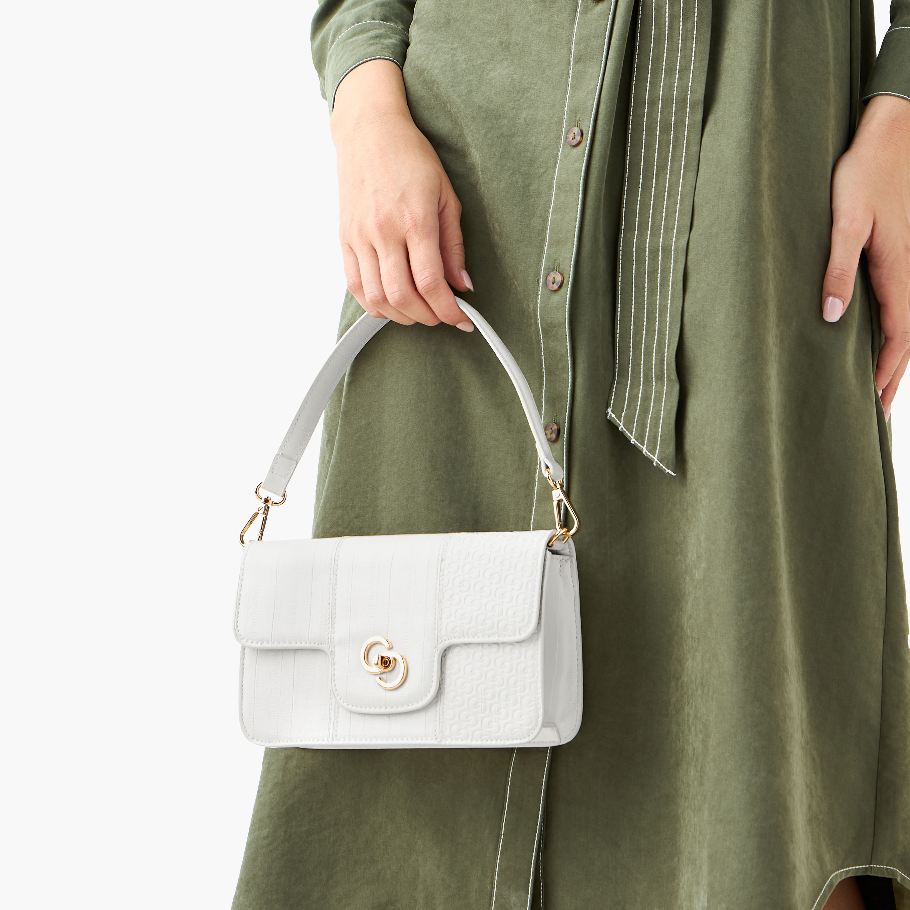 شنطة كروس بودي بقفل دوار ونقوش مونوجرام من سيليست-women-bagsandwallets-handbags-image-8