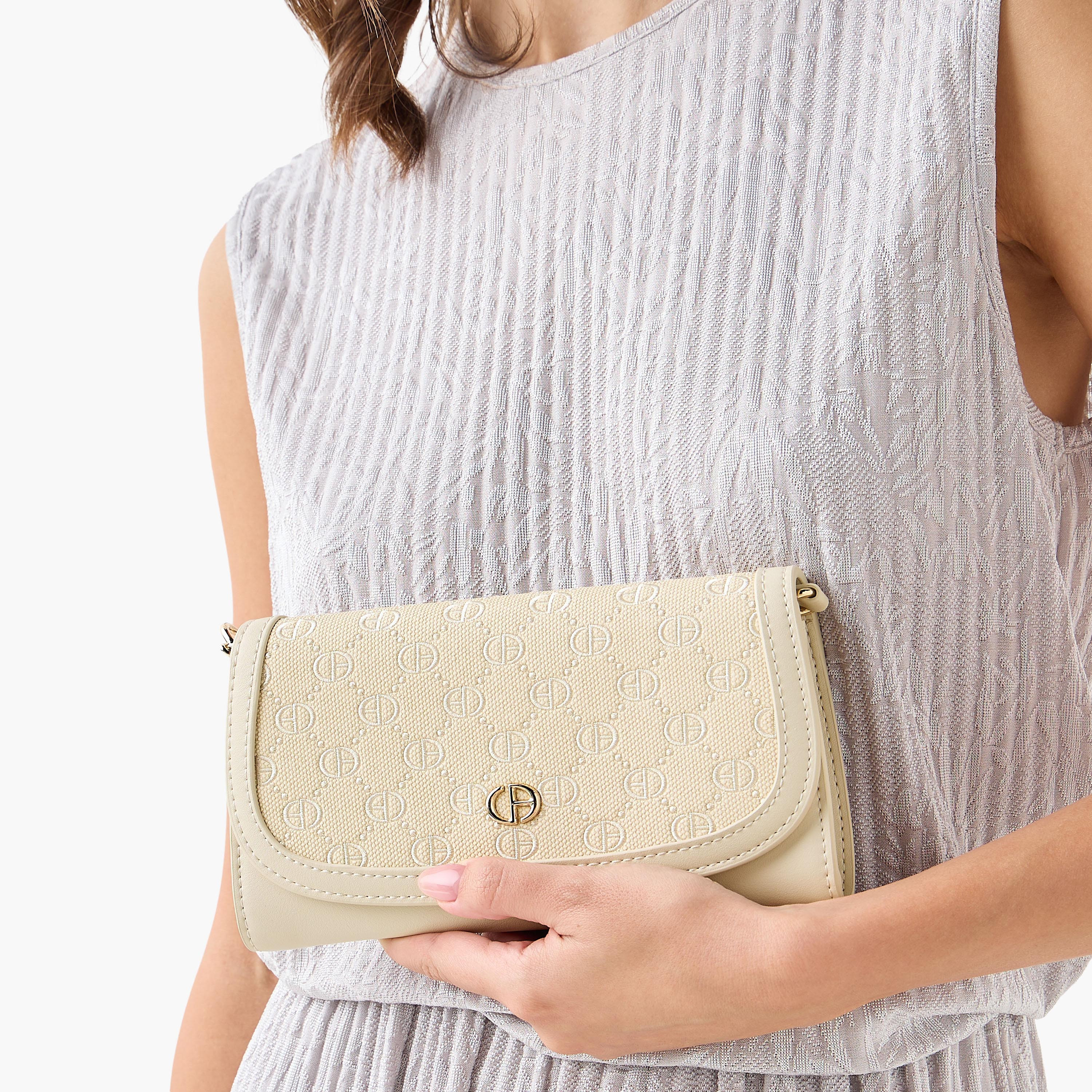 شنطة كروس بودي بارزة الملمس بنقوش مونوجرام بحزام سلسلة وطيّة إغلاق من كريسبيلا-women-bagsandwallets-handbags-image-2