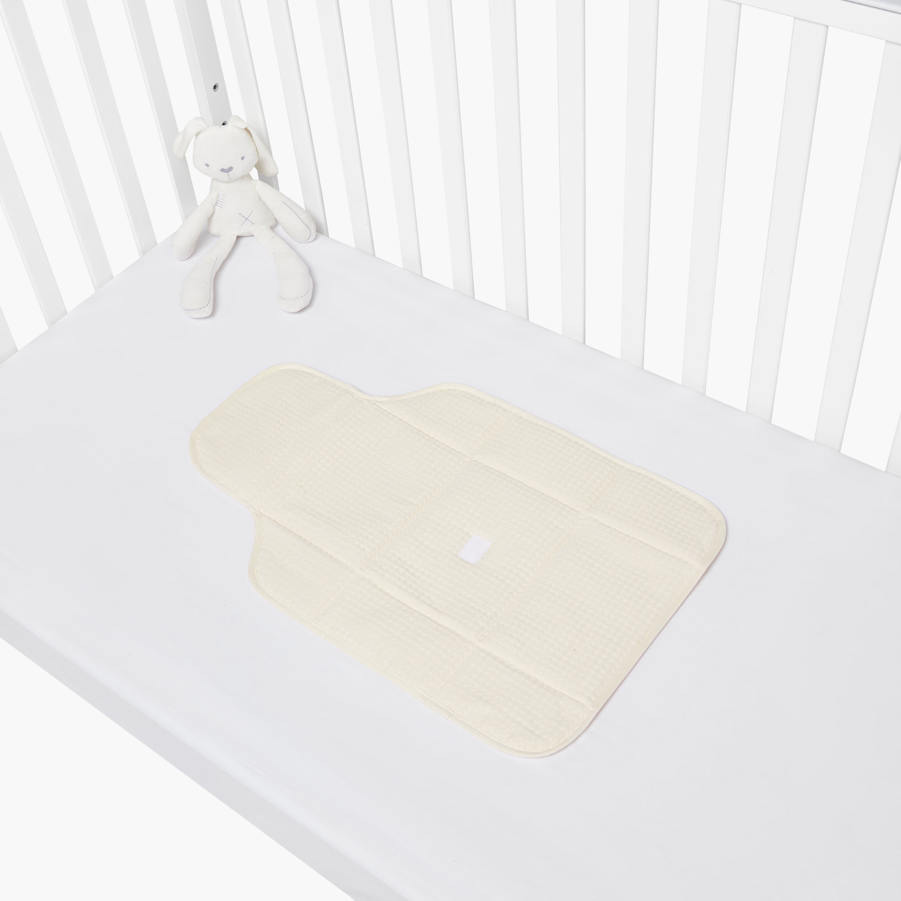حصيرة غيار أطفال بنسيج الوافل من جيجلز-baby-diapering-changingmats-image-3