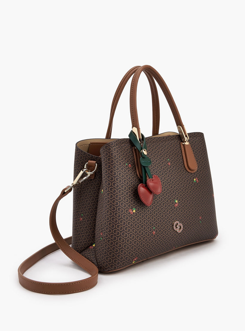 شنطة توتي بمقابض مزدوجة وطبعات كرز مونوجرام من سيليست-women-bagsandwallets-handbags-image-4