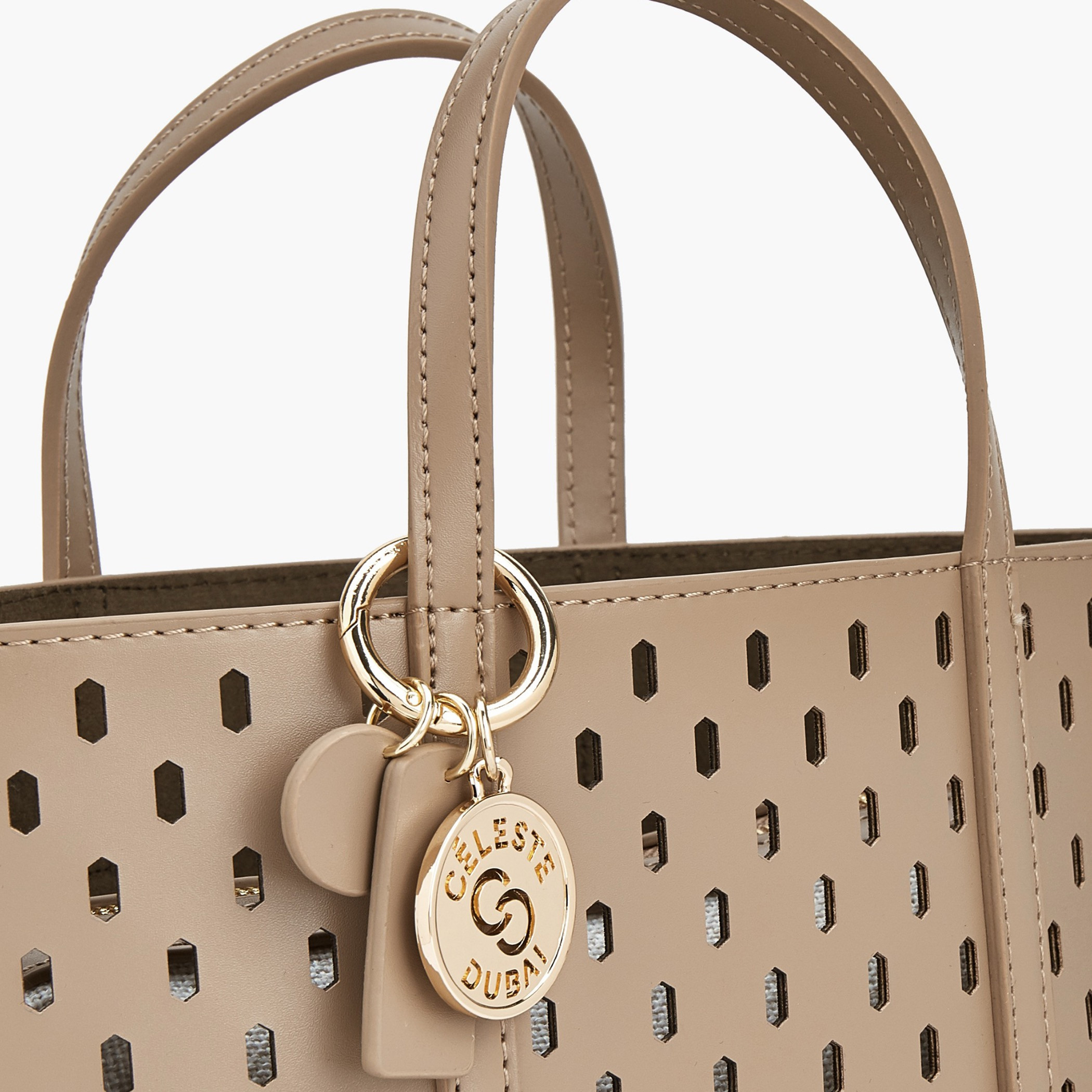شنطة توت بتفاصيل مفرغة وشنطة صغيرة من سيليست-women-bagsandwallets-handbags-image-4