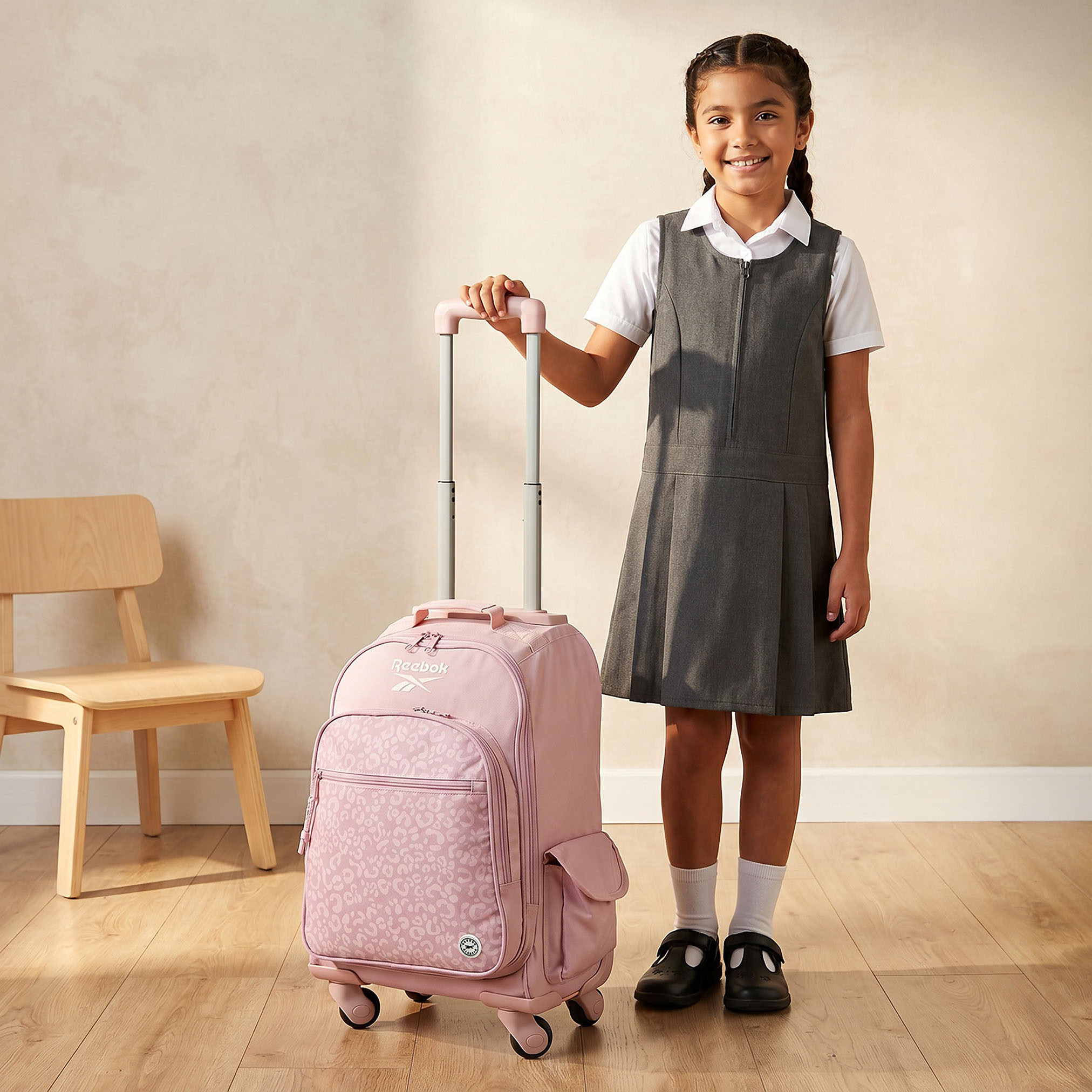 شنطة ظهر ترولي للبنات 8-13 سنة بجيب قارورة ماء وطبعات ماورا من ريبوك - 17 بوصة-school-bagsandbackpacks-trolleybags-image-3
