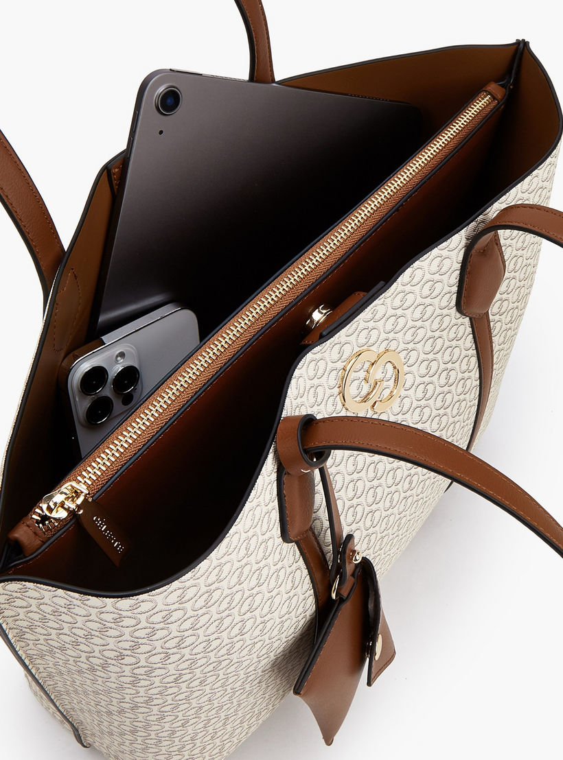 شنطة توتي بطبعات وبزر إغلاق مع محفظة عملات معدنية من سيليست-women-bagsandwallets-handbags-image-7