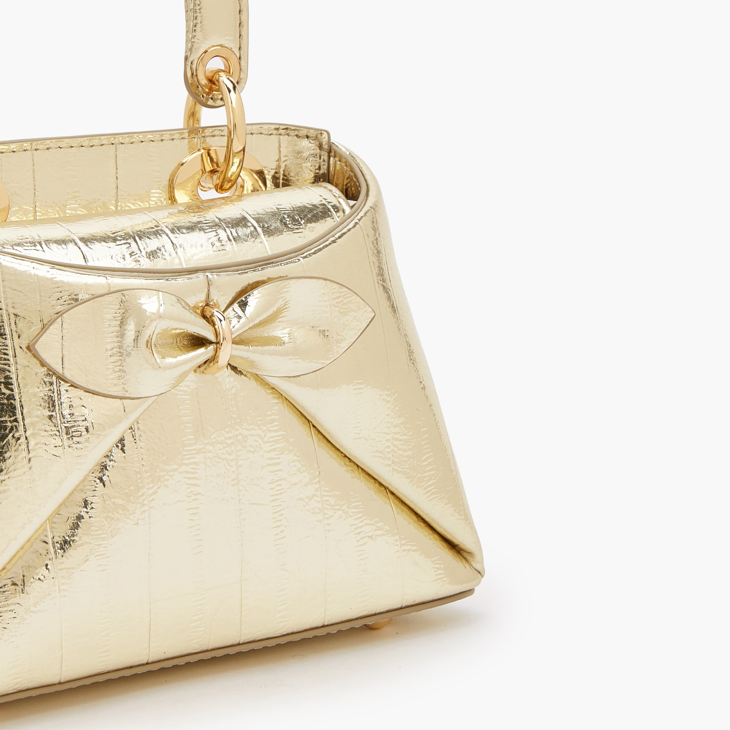شنطة كروس بودي بزينة فيونكة ومقبض علوي من سيليست-women-bagsandwallets-handbags-image-4