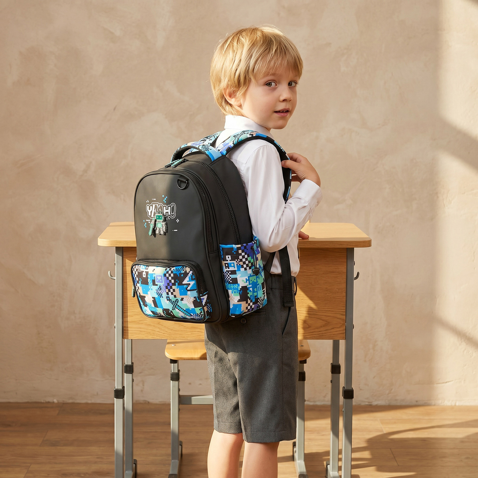 شنطة ظهر بجيب لابتوب وطبعات ألعاب للأولاد بعمر 5-8 سنوات من جونيورز - 15 بوصة-school-bagsandbackpacks-backpacks-image-2
