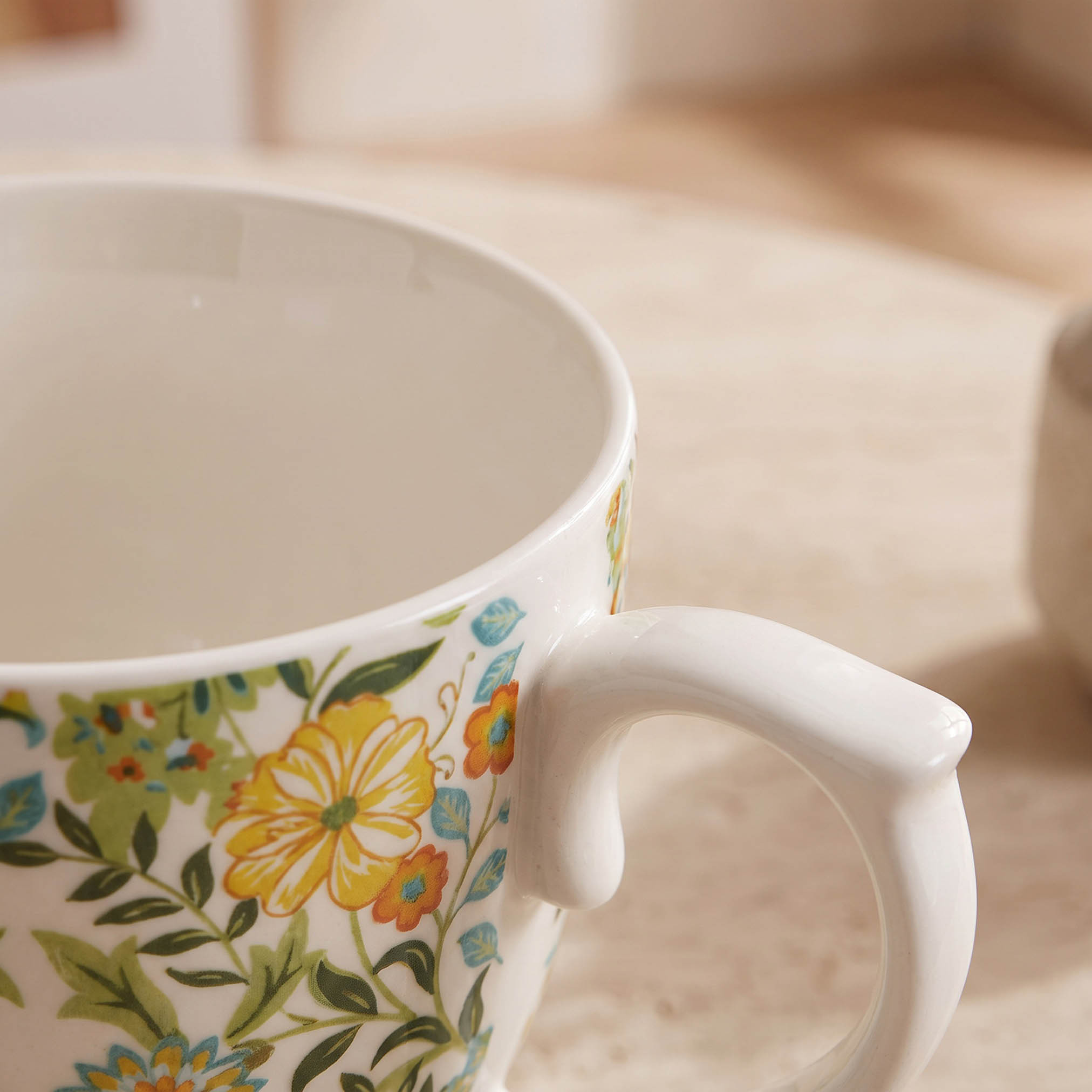 مج خزف صيني بقاعدة وطبعات زهرية - 360 مل-household-dining-teaandcoffee-mugsandcups-image-3