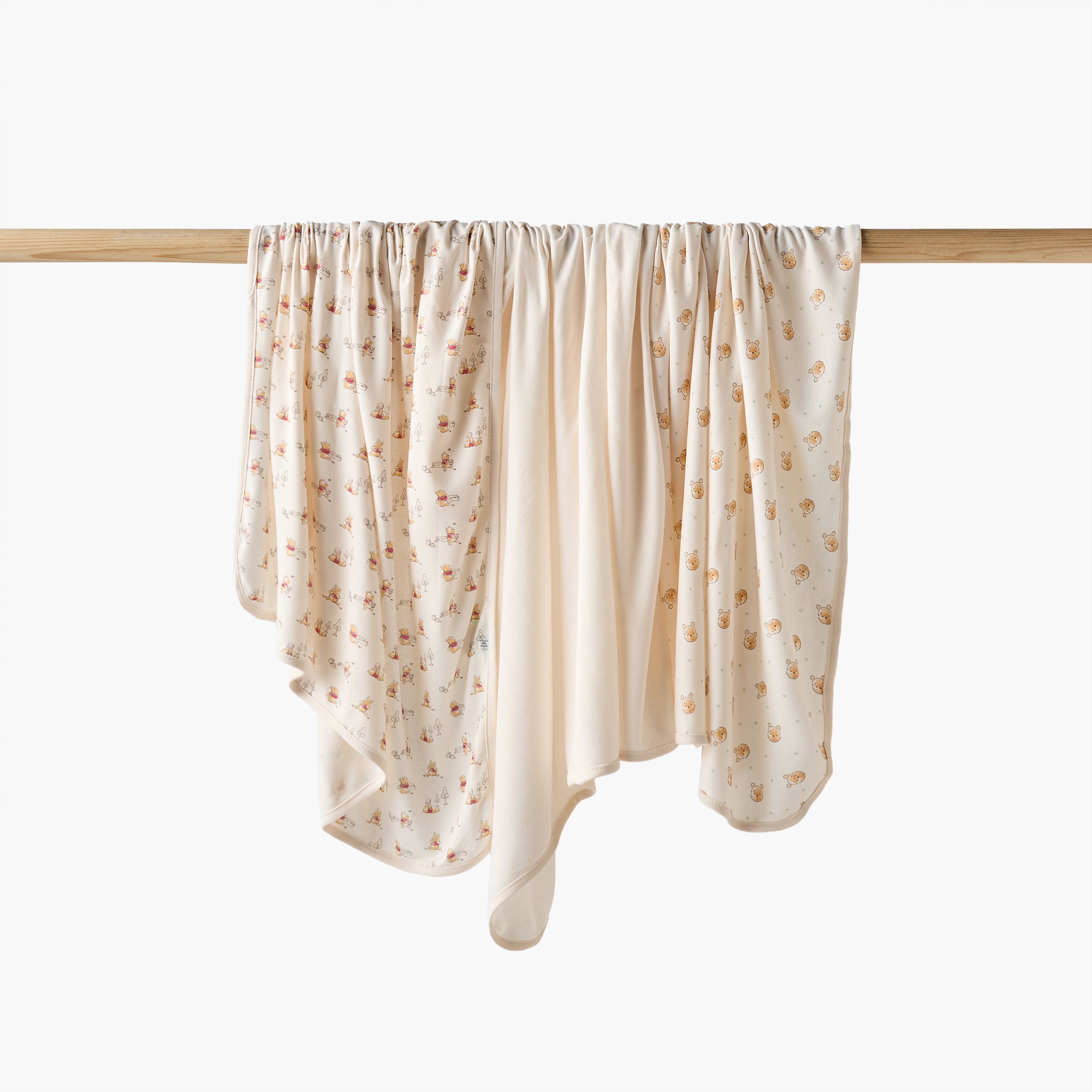 بطانيات حديثي الولادة من الخيزران بطبعات ويني ذا بوه من ديزني - عبوة من 3 قطع-baby-nursery-blanketsandswaddles-blanketsandquilts-image-1