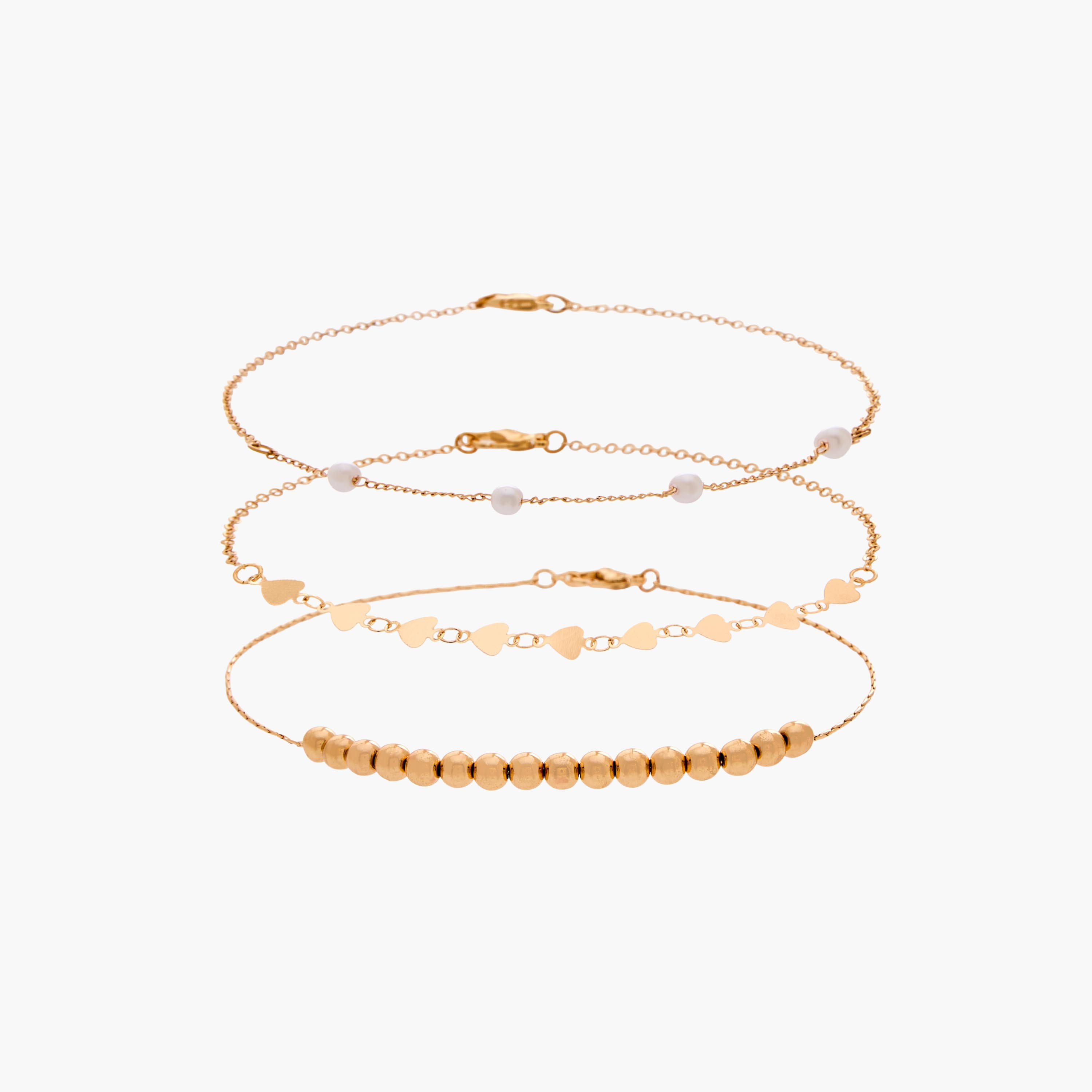 طقم خلاخيل متنوعة بلون ذهبي من 3 قطع-women-watchesandjewellery-jewellery-anklets-image-1