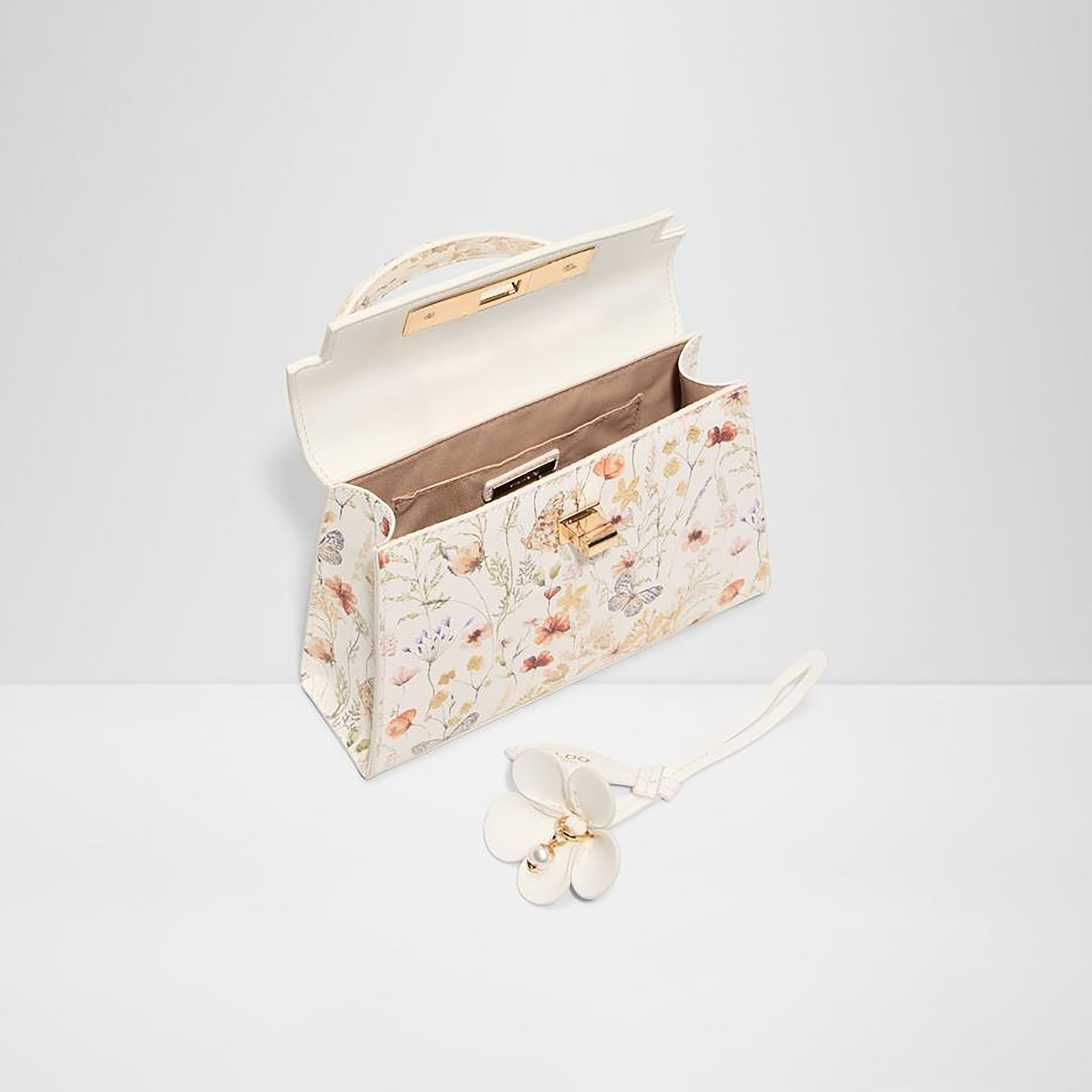 حقيبة ألدو ليورا الصغيرة ذات المقبض العلوي بنقشة الزهور، مزودة بقفل دوار وحزام سلسلة.-women-bagsandwallets-handbags-image-3