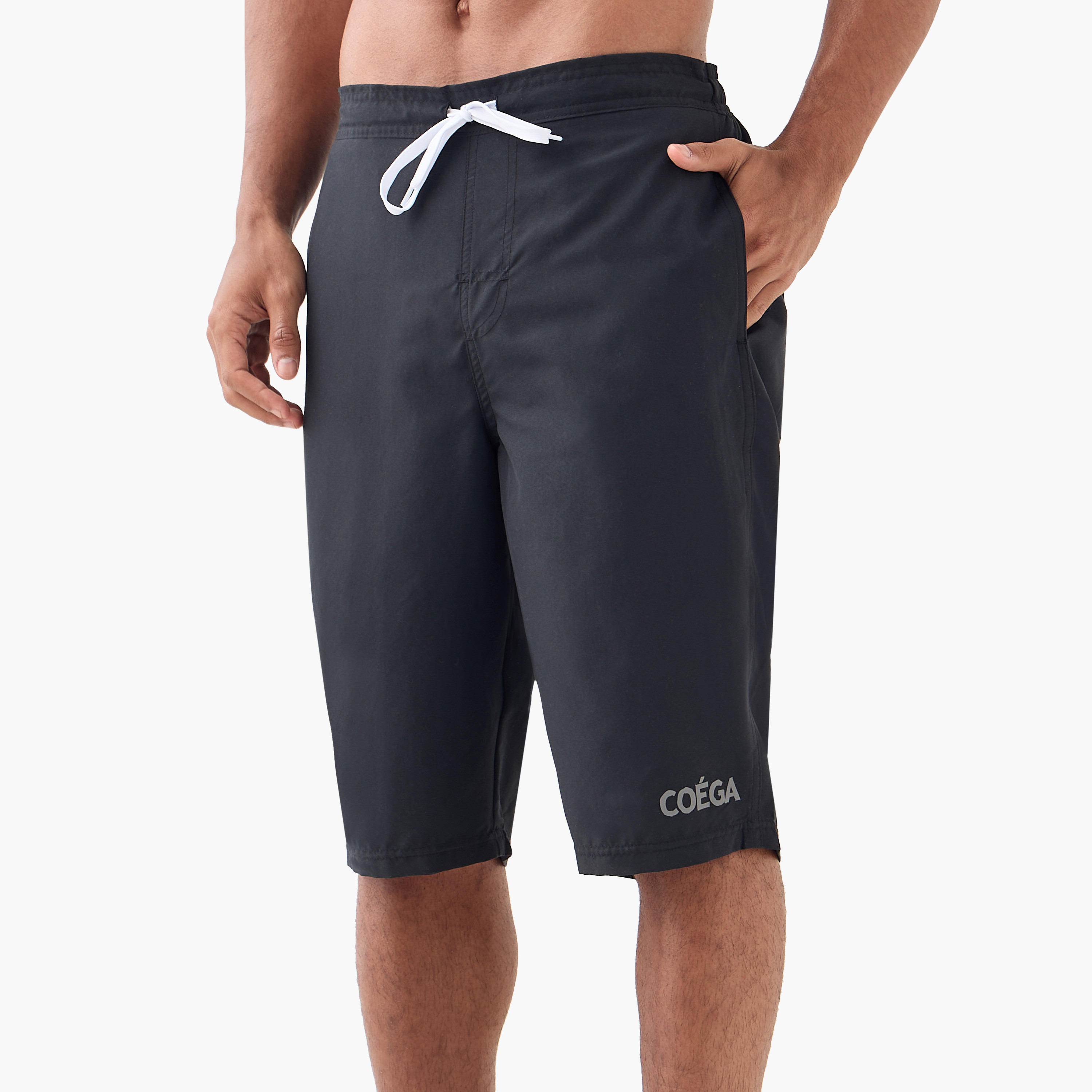كابريس السباحة الرجالي من كويغا بلون أسود-sports-men-clothing-swimwear-image-1