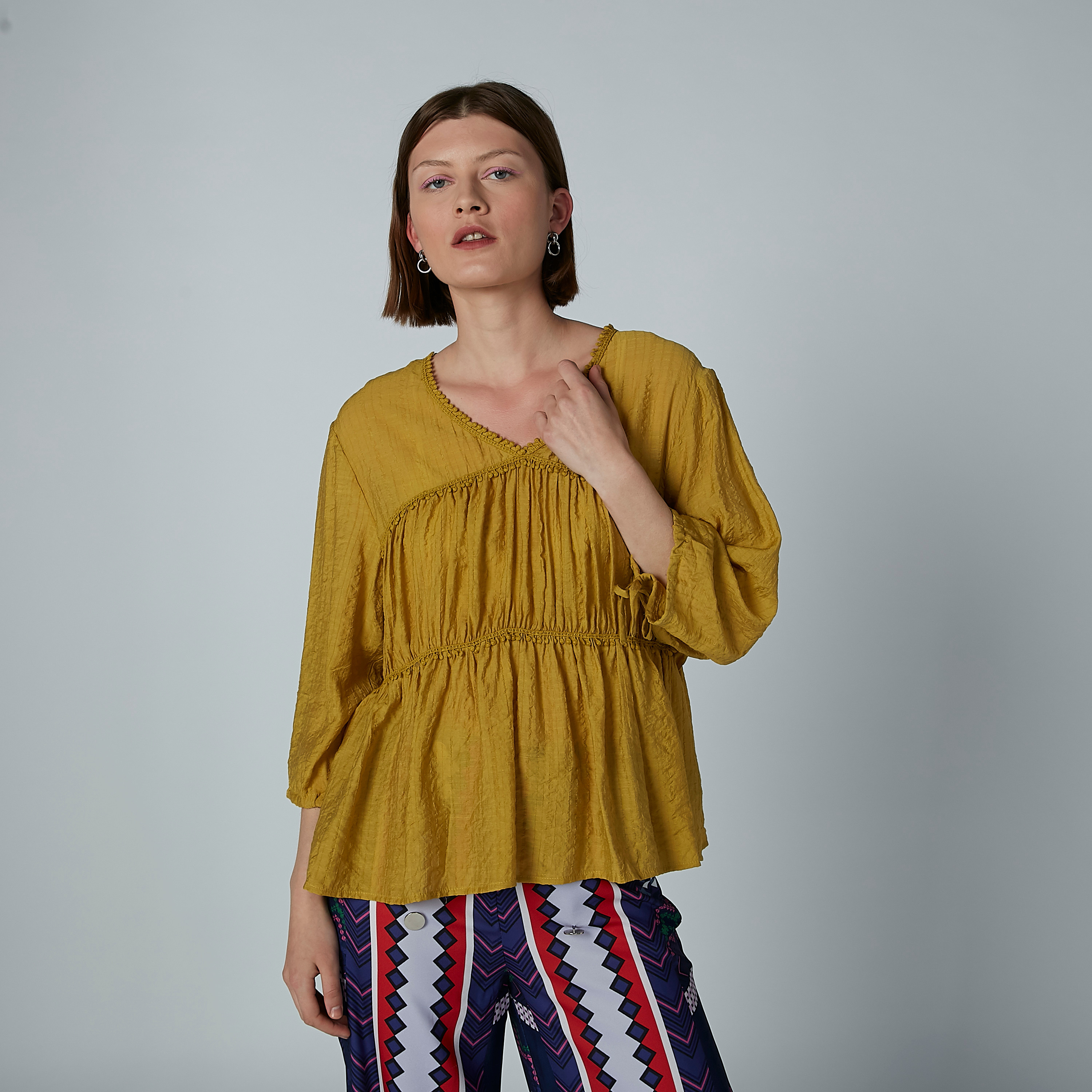 Iconic Pom-Pom Detail Top with V-neck-women-clothing-shirtsandblouses-blouses-image-1