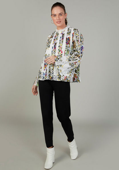 Iconic Floral Printed Top with High Neck and Flared Sleeves