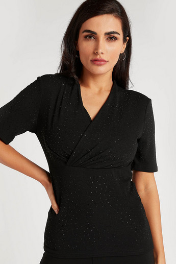 Iconic Embellished Peplum Top with V-neck and Short Sleeves