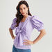 Iconic Solid Top with Short Puff Sleeves and Knotted Front-Shirts & Blouses-thumbnailMobile-0