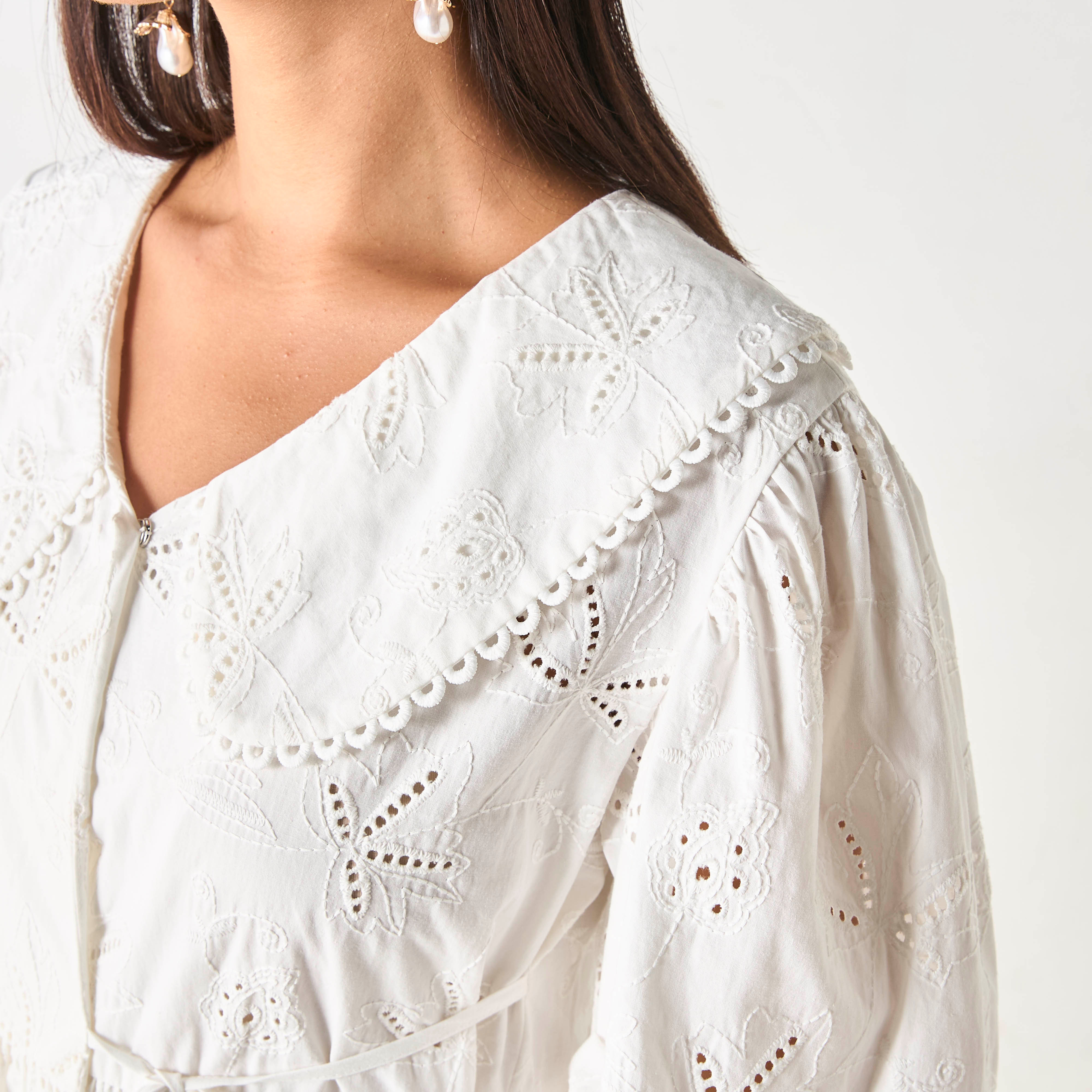 Buy Iconic All Over Embroidered Peplum Top with Tie Ups Splash UAE