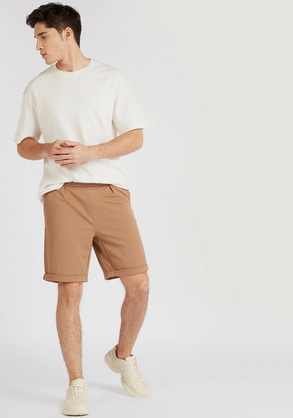 Iconic Textured Shorts with Pockets and Rolled-Up Hem-Shorts-image-1