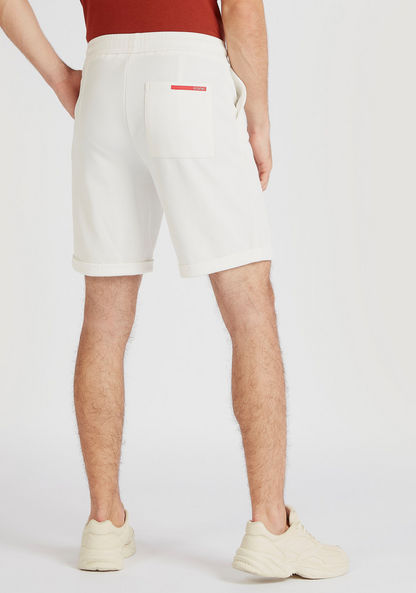 Iconic Textured Shorts with Pockets and Rolled-Up Hem