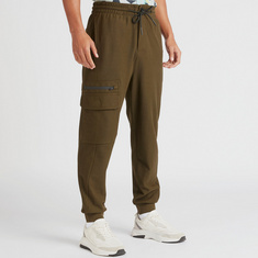 Iconic Solid Joggers with Flap Pockets and Drawstring Closure
