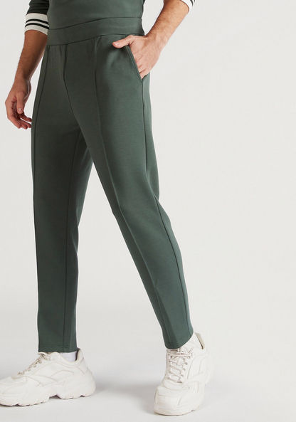 Iconic Solid Mid-Rise Flexi Waist Joggers with Pockets