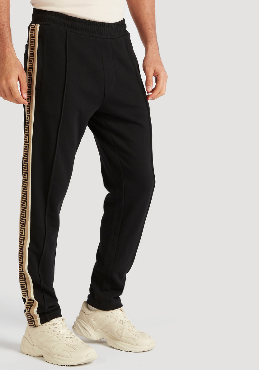 Iconic Solid Joggers with Pockets and Tape Detail-Joggers-image-0