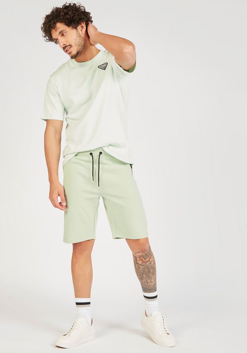 Iconic Solid Shorts with Drawstring Closure and Zip Pockets-Shorts-image-1