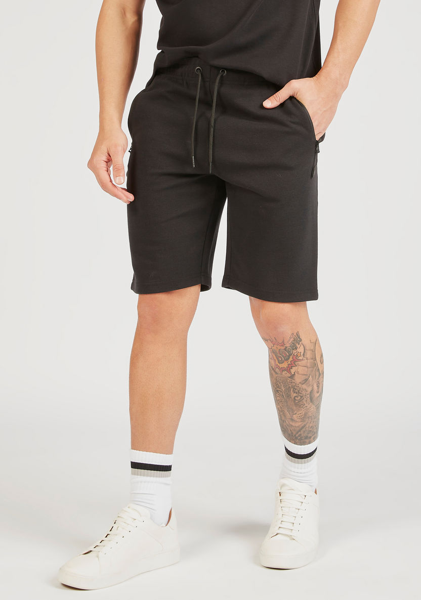 Iconic Solid Shorts with Drawstring Closure and Zip Pockets-Shorts-image-0