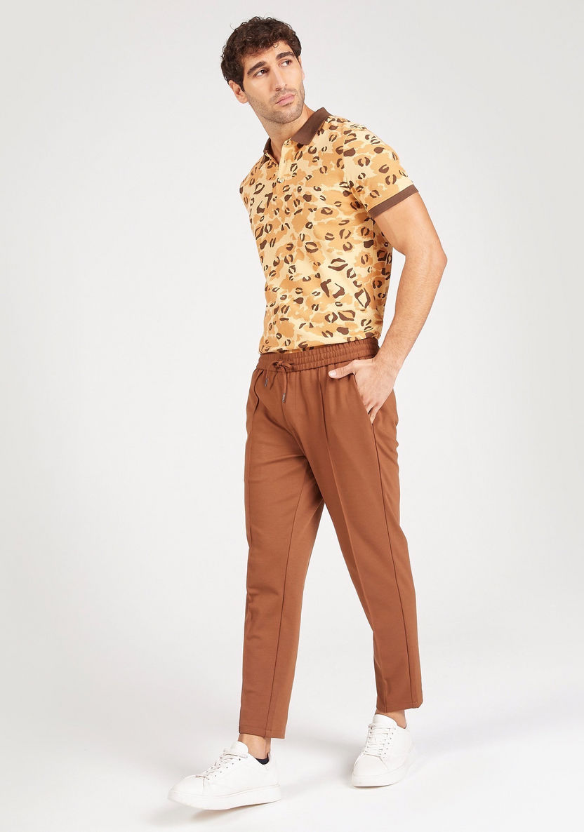 Iconic Animal Print Polo T-shirt with Short Sleeves and Button Closure-Polos-image-1