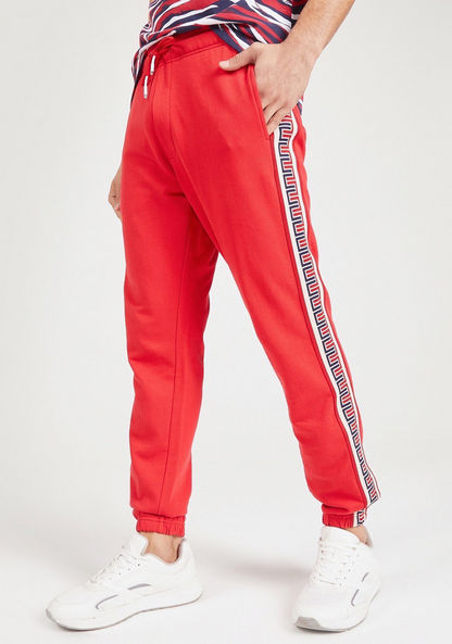 Iconic Solid Joggers with Drawstring Closure and Tape Detail-Joggers-image-0