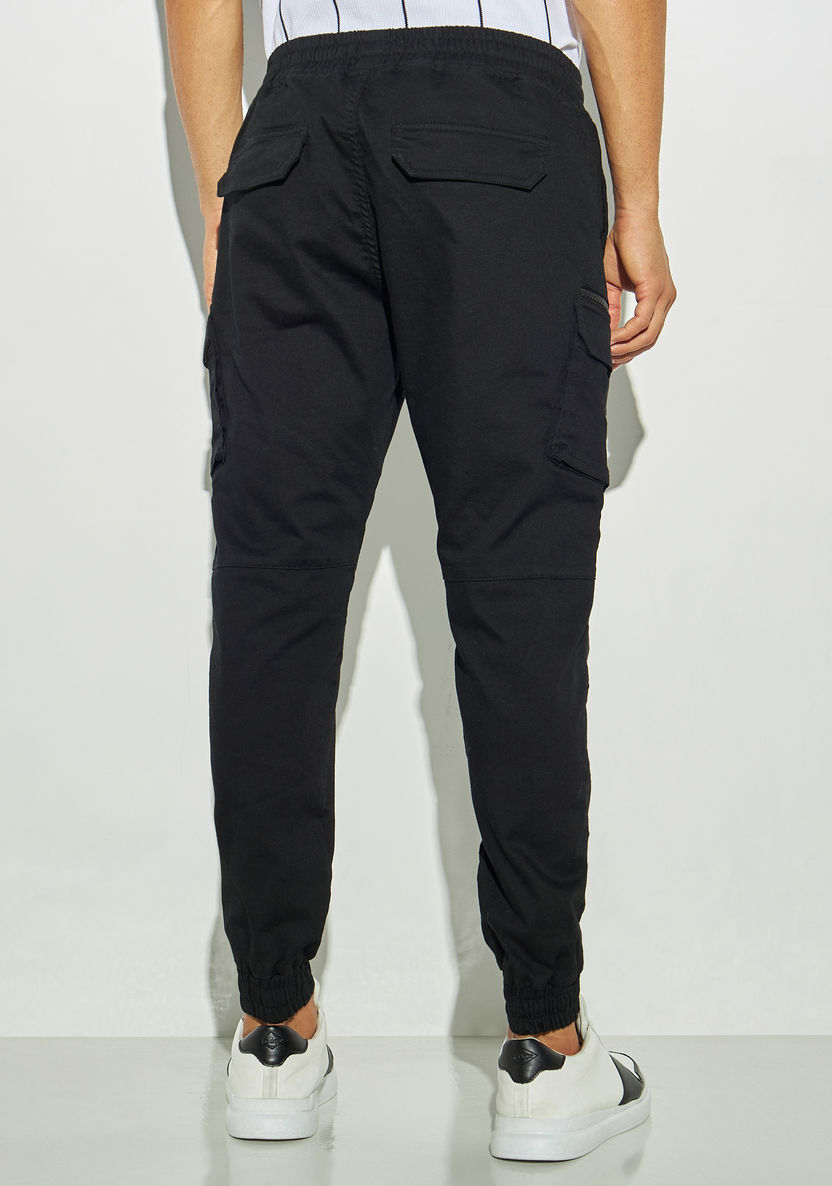 Buy Men's Iconic Solid Cargo Joggers with Zipper Detail Online ...
