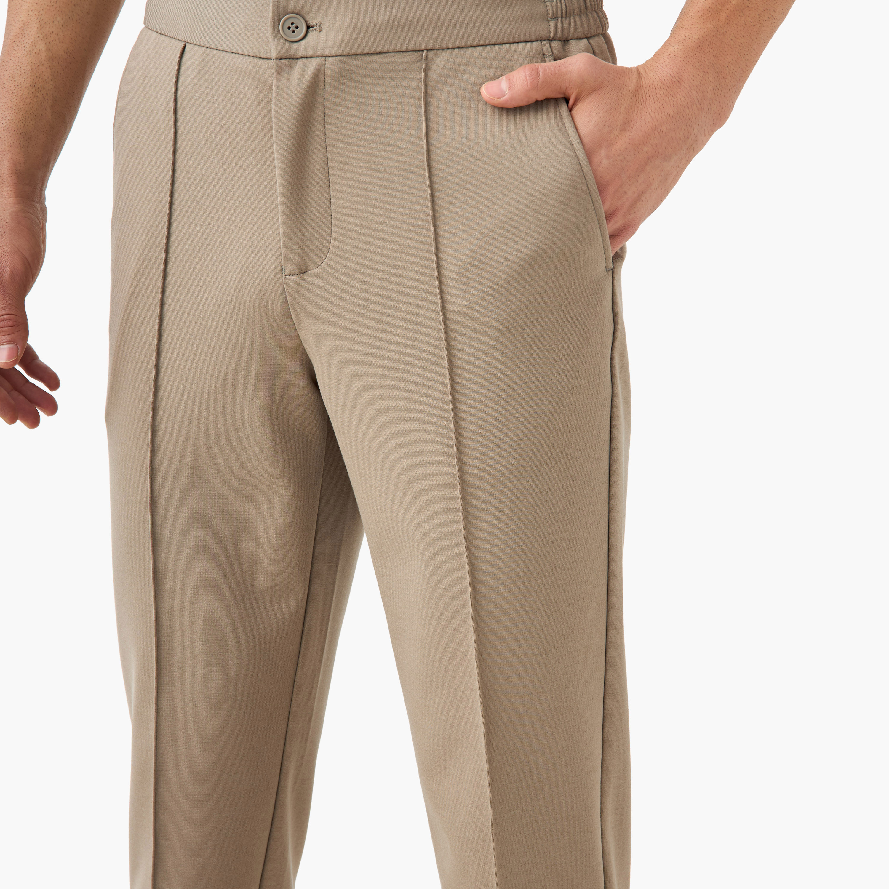 بنطلون بقصّة عادية وخصر مطاطي وجيوب من أيكونيك-men-clothing-bottoms-trousersandchinos-trousers-image-9