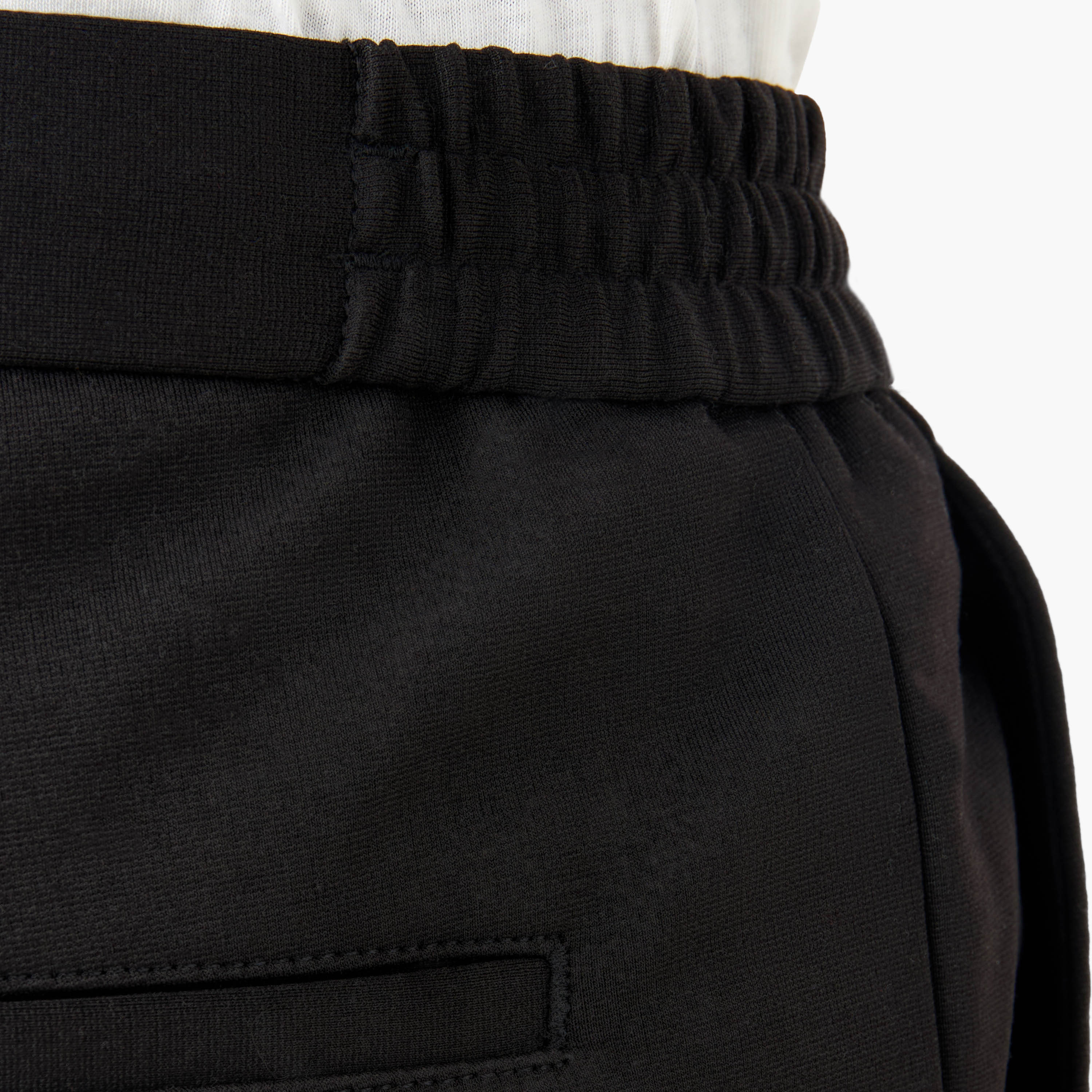 بنطلون بقصّة عادية وخصر مطاطي وجيوب من أيكونيك-men-clothing-bottoms-trousersandchinos-trousers-image-5