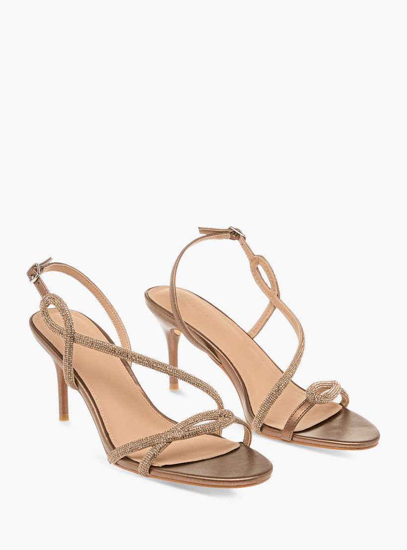 صندل مزيّن بكعب ستيليتو وإبزيم إغلاق من فلورا بيلا-women-shoes-sandals-heeled-image-1