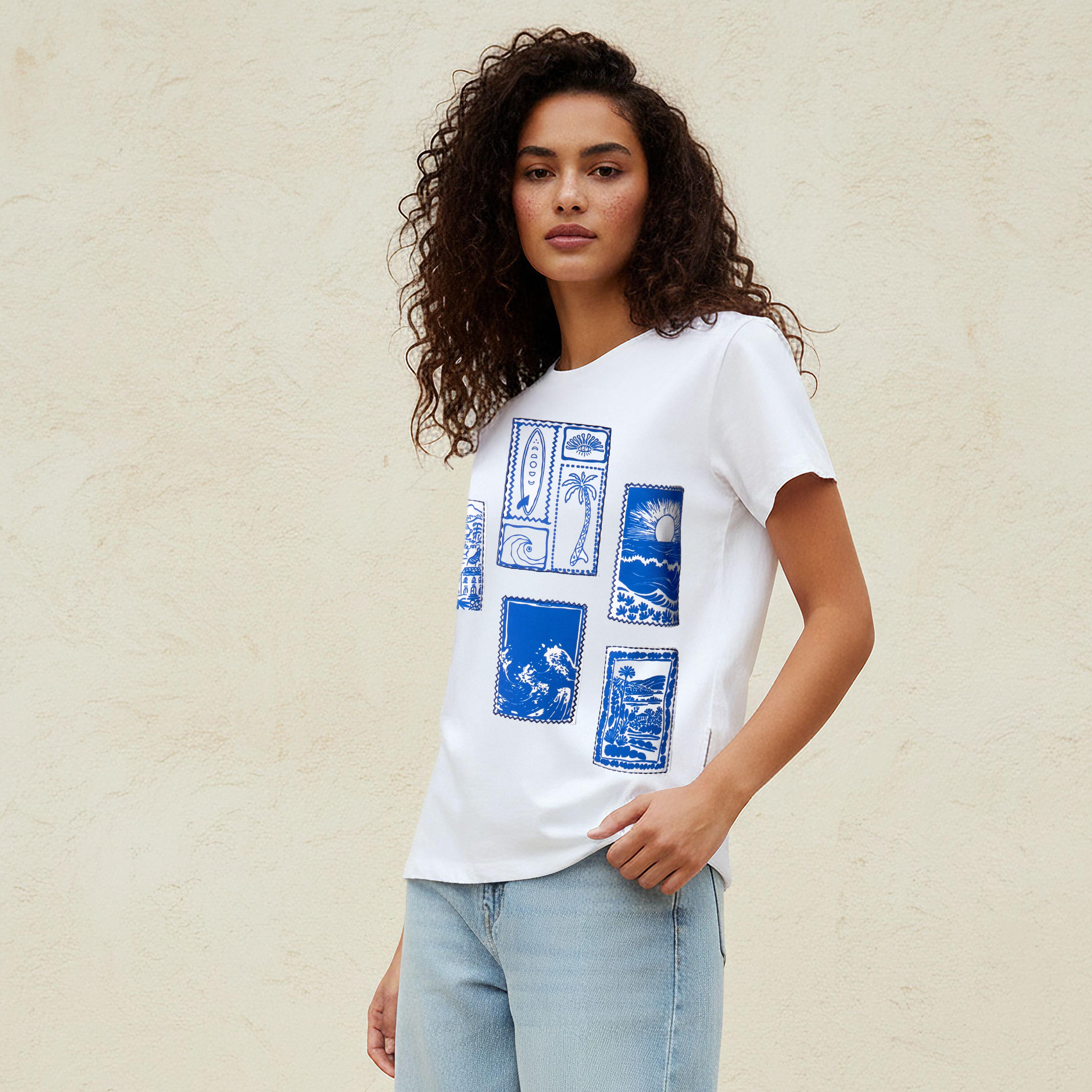 تيشيرت قطن بقصة عادية وطبعات جرافيك من لي كوبر-women-clothing-tshirts-image-1