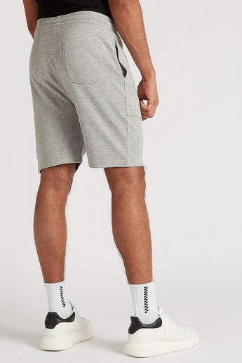 Sustainable Solid Mid-Rise Shorts with Drawstring Closure