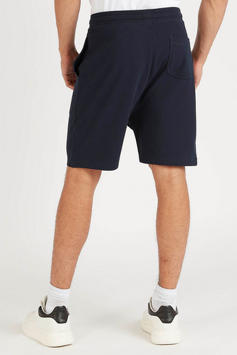 Sustainable Solid Mid-Rise Shorts with Drawstring Closure