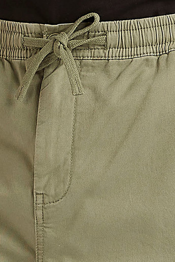 Sustainable Solid Mid-Rise Shorts with Drawstring Closure and Pockets