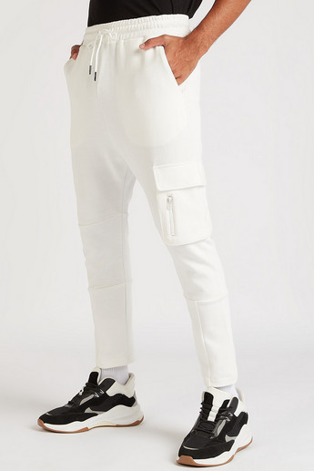 Sustainable Solid Mid-Rise Pants with Drawstring and Pockets
