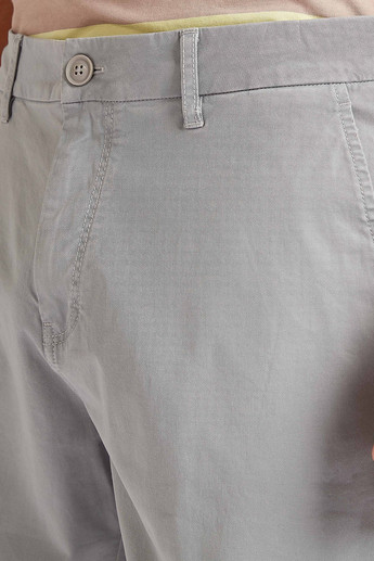 Sustainable Solid Mid-Rise Shorts with Button Closure