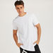 Solid Longline T-shirt with Asymmetric Hem and Crew Neck-T Shirts-thumbnailMobile-0