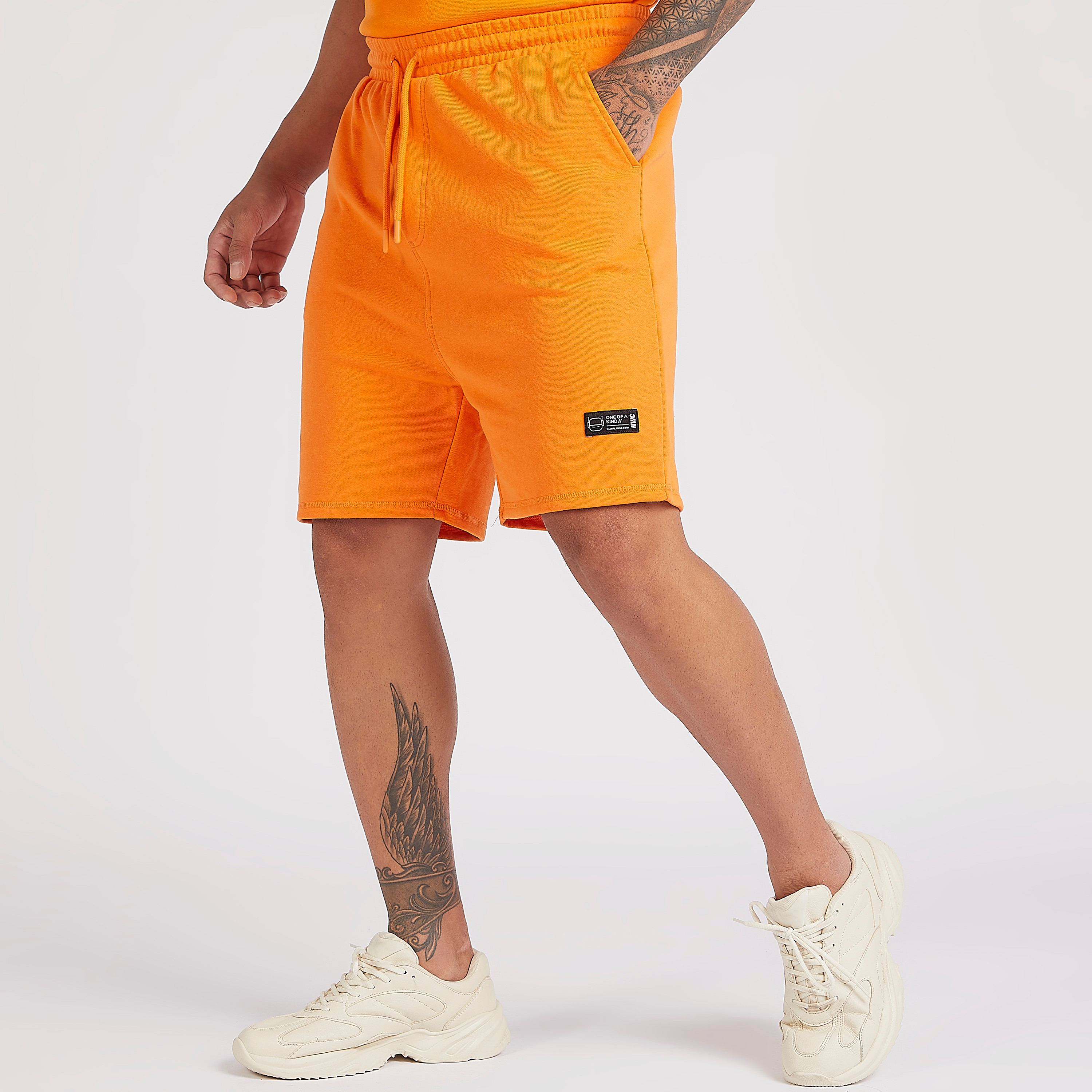 Buy Men s Solid Knee Length Shorts with Drawstring Closure Online Centrepoint Qatar