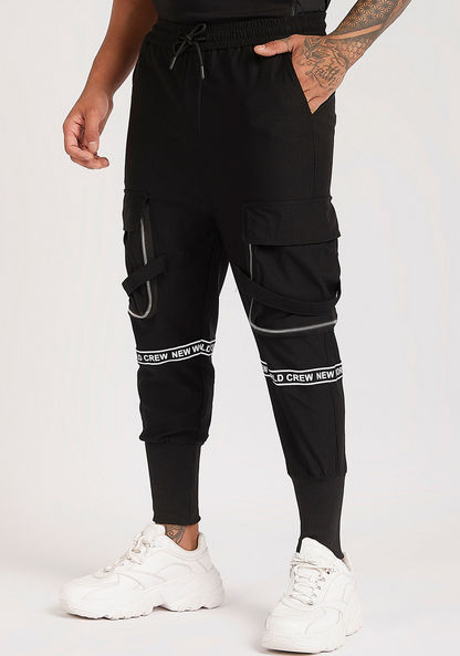 Printed Mid-Rise Slim Fit Joggers with Zipper Detailed Pockets