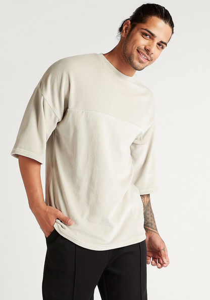 Solid Oversized T-shirt with 3/4 Sleeves and Crew Neck
