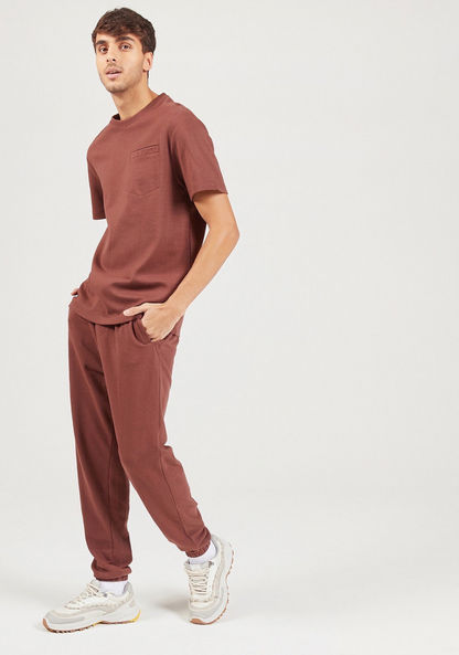 Solid Joggers with Drawstring Closure and Pockets-Joggers-image-1
