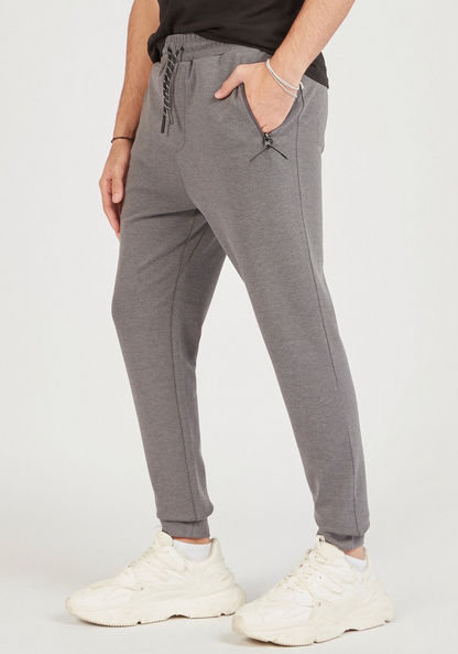 Solid Mid-Rise Joggers with Drawstring Closure and Zipped Pockets-Joggers-image-0
